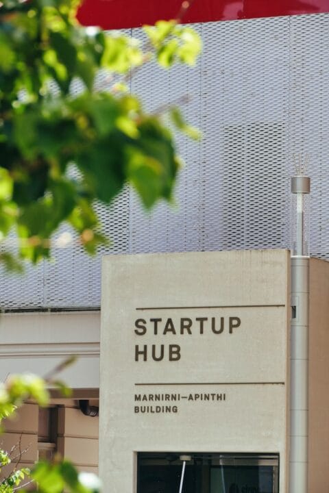 A building with a sign that says start up hub